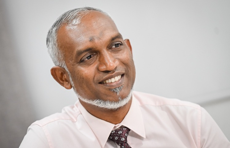 Maldives housing policy spouses eligible land application